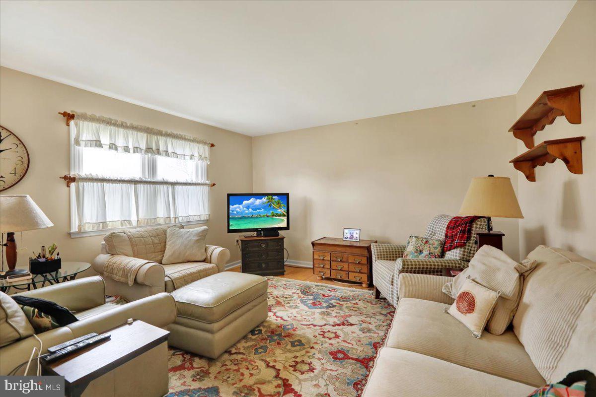 1839 Shellbark Drive Reading, PA 19608 - Photo 13 of 32 a living room with furniture and a flat screen tv