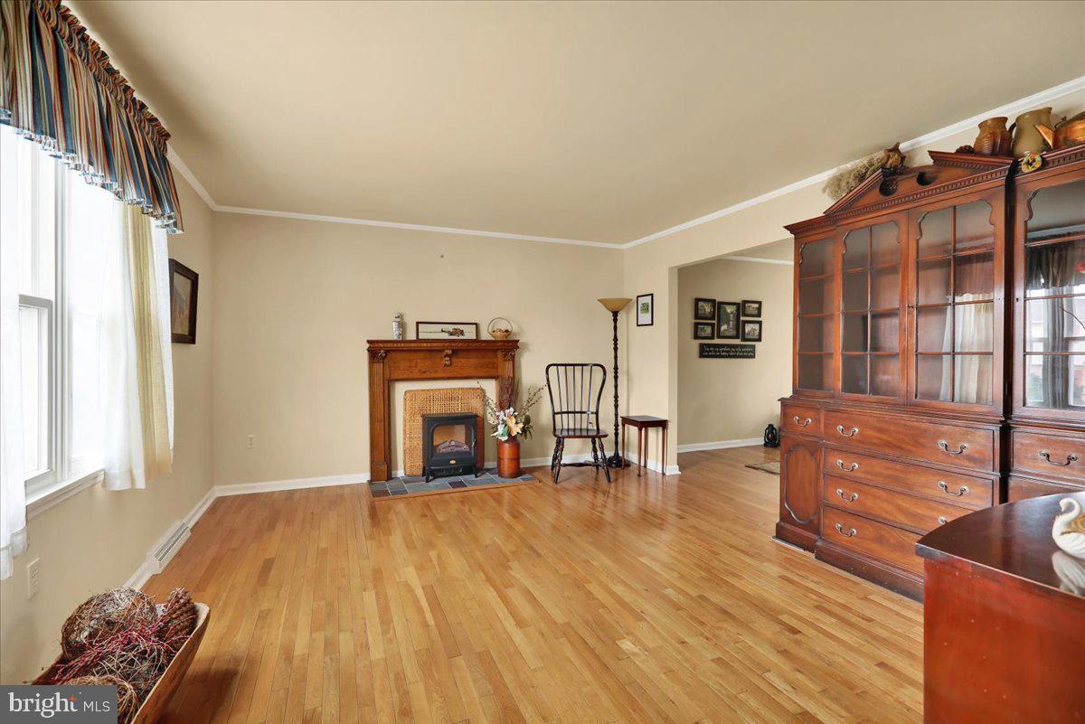 1839 Shellbark Drive Reading, PA 19608 - Photo 5 of 32 a living room with furniture and a fireplace