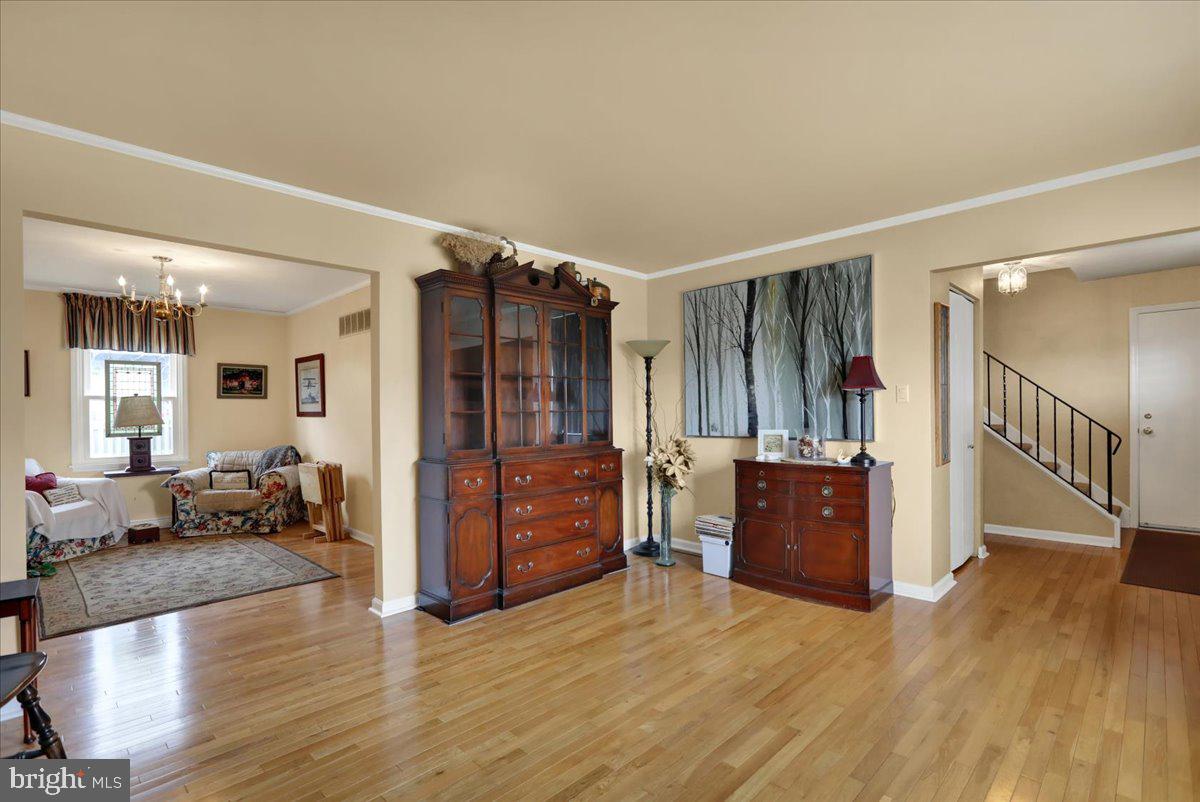 1839 Shellbark Drive Reading, PA 19608 - Photo 6 of 32 a living room with furniture and a wooden floor