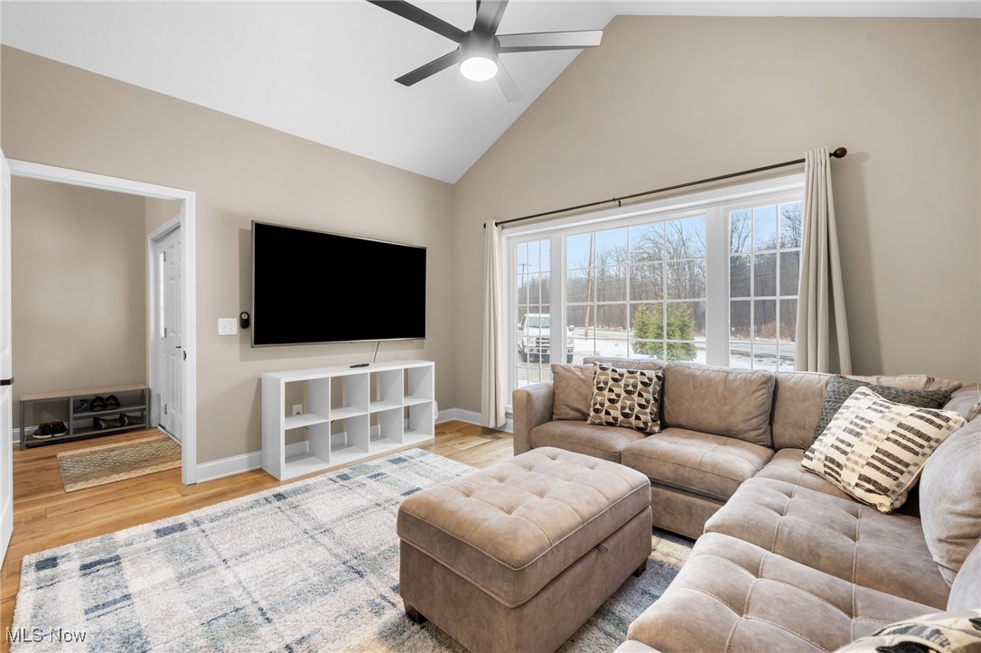 39600 Aurora Road Solon, OH 44139 - Photo 7 of 49 Living room featuring high vaulted ceiling and a ceiling fan can also be a BR/office/den