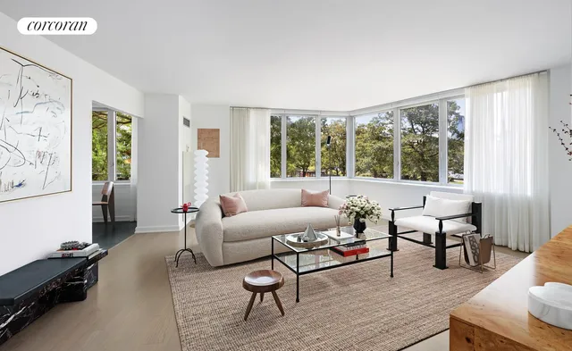 a living room with furniture and a window