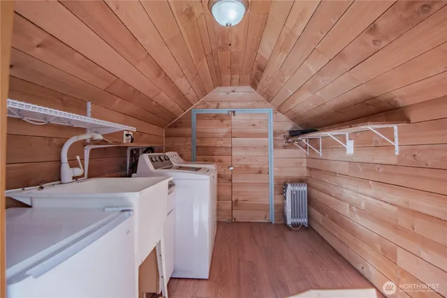 a utility room with dryer and washer