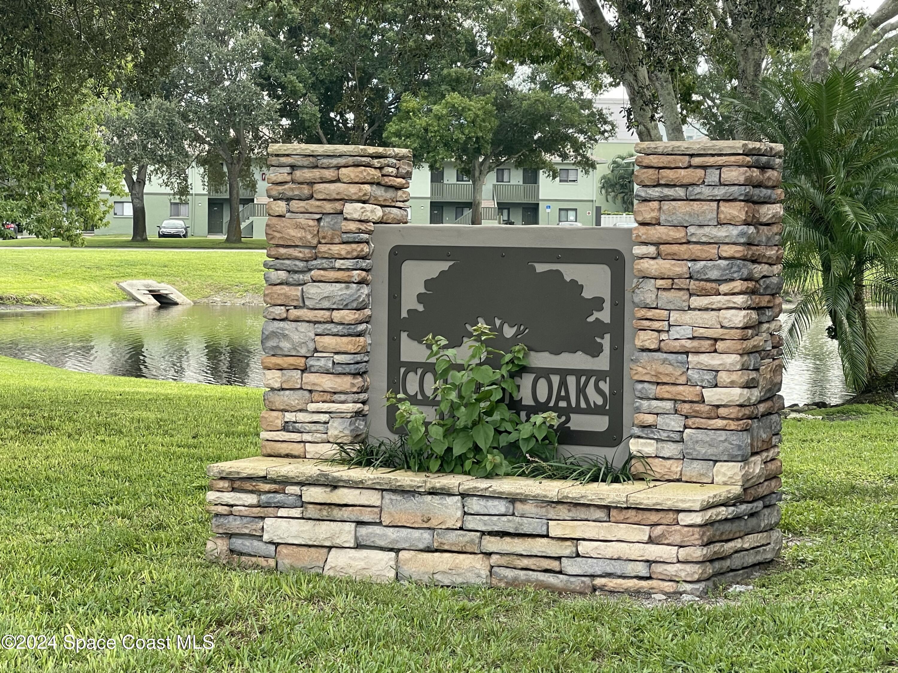 1804 University Lane Cocoa, FL 32922 - Photo 2 of 4 a view of a back yard of the house with a bench