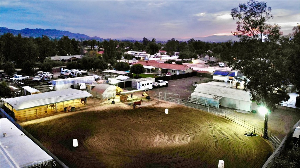 a view of a swimming pool with outdoor seating