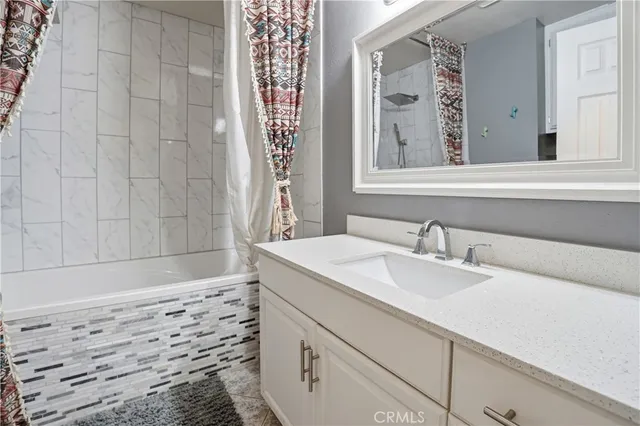 a view of a swimming pool and an outdoor seating