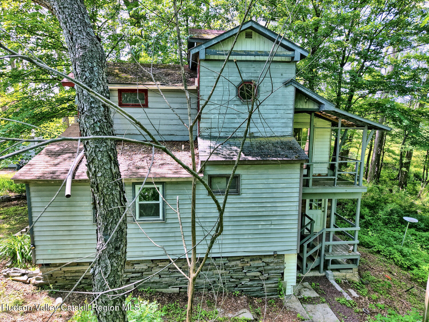 360 Stone Bridge Rd Extension East Durham, NY 12423 - Photo 65 of 83 a front view of a house with garden