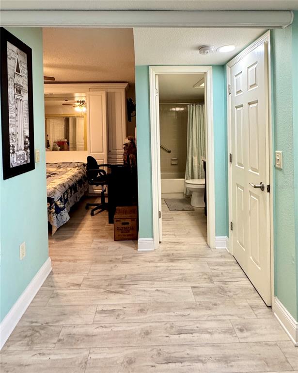 4620 Bay Boulevard, Unit 1145 Port Richey, FL 34668 - Photo 16 of 47 a view of a room with wooden floor and furniture