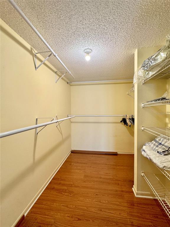 4620 Bay Boulevard, Unit 1145 Port Richey, FL 34668 - Photo 34 of 47 a view of a bathroom with a tub and a shower
