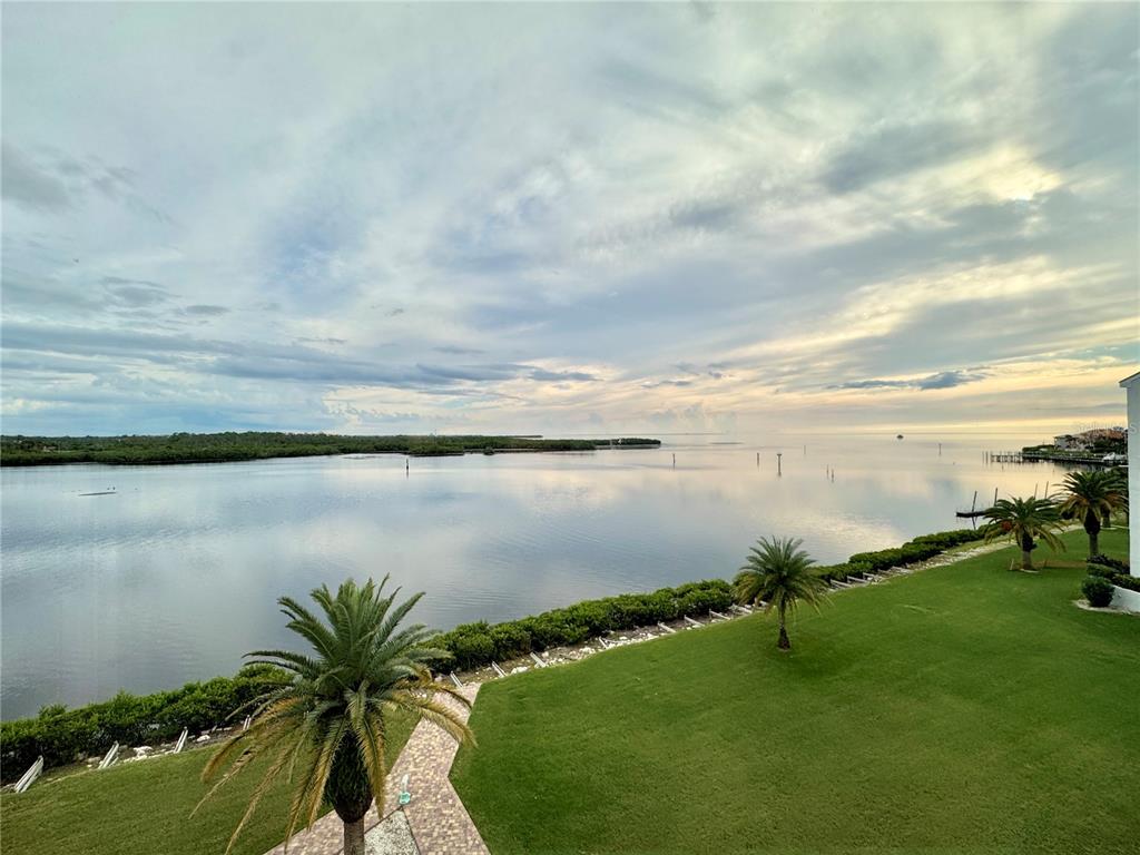 4620 Bay Boulevard, Unit 1145 Port Richey, FL 34668 - Photo 35 of 47 a view of a lake from a yard