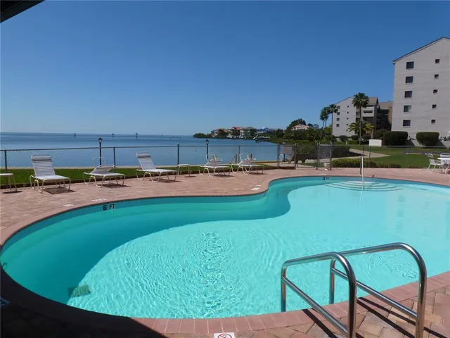 a view of green field with house