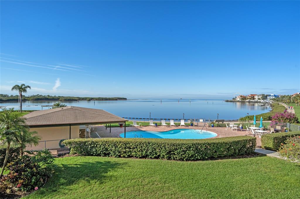 4620 Bay Boulevard, Unit 1145 Port Richey, FL 34668 - Photo 46 of 47 a view of green field with house