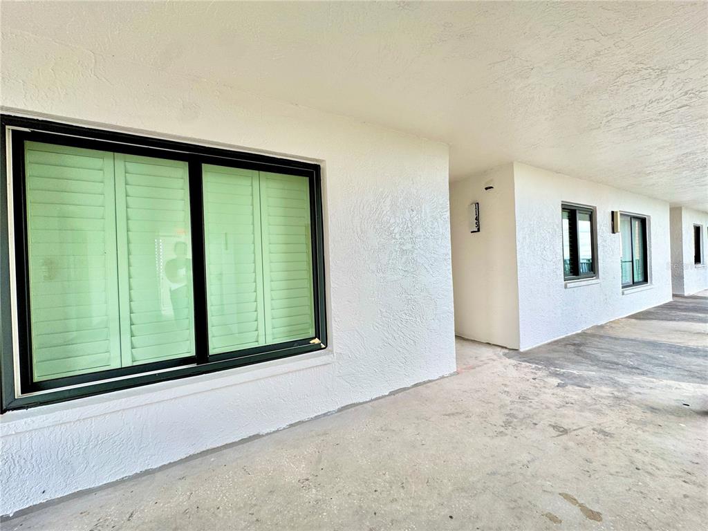 4620 Bay Boulevard, Unit 1145 Port Richey, FL 34668 - Photo 6 of 47 a view of a room that has a large window