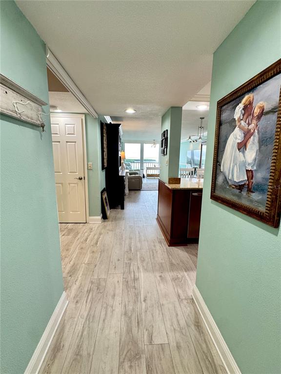 4620 Bay Boulevard, Unit 1145 Port Richey, FL 34668 - Photo 8 of 47 a view of a living room with furniture and a flat screen tv