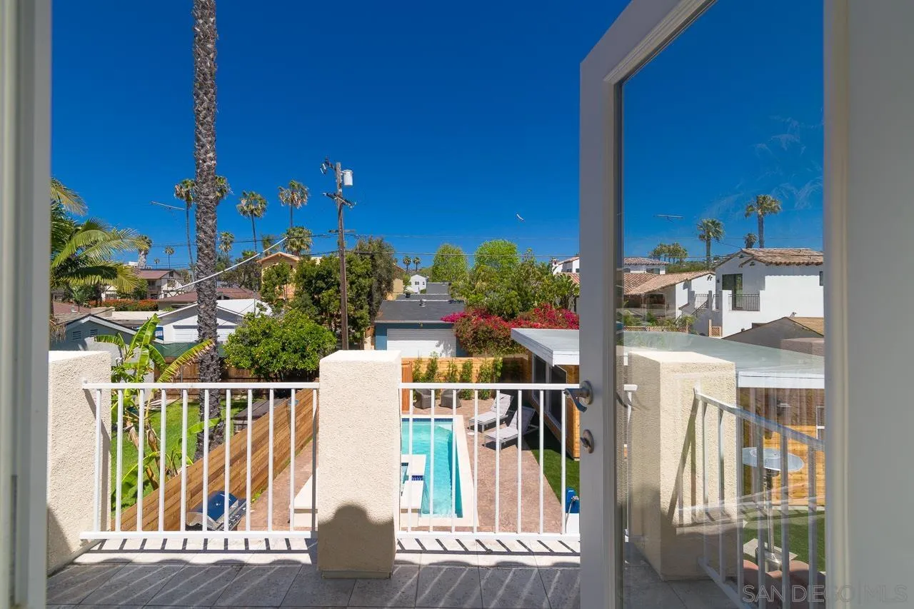 1220 Emerald Street San Diego, CA 92109 - Photo 11 of 19 a balcony view with a potted plant