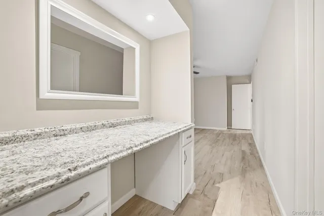 a view of a kitchen cabinets