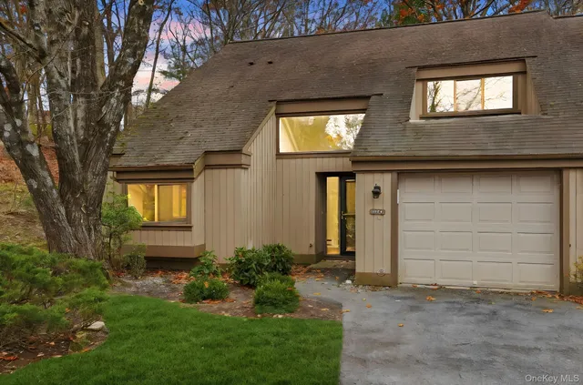 a front view of a house having yard