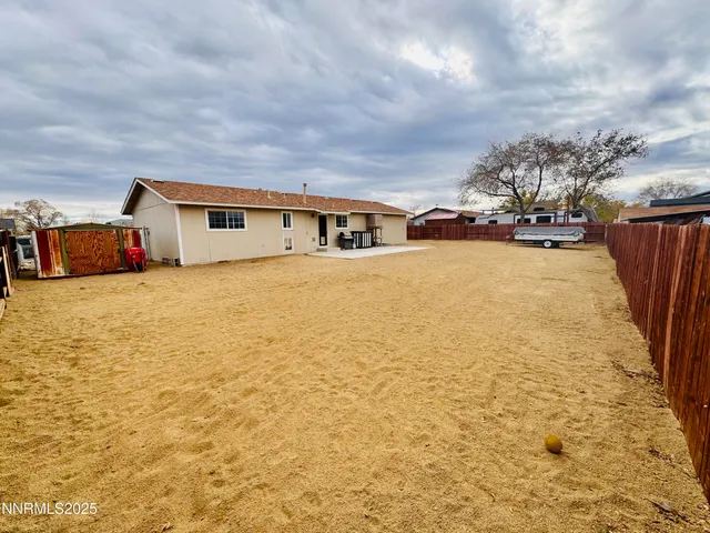 a view of a terrace with yard