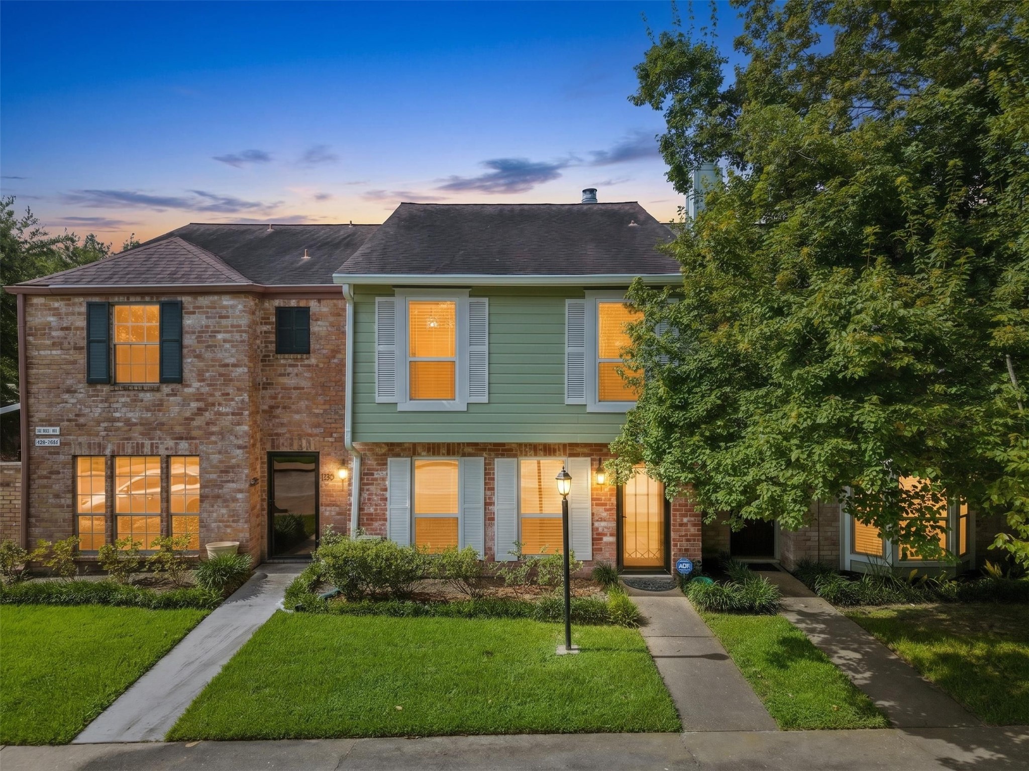 5801 Lumberdale Road, Unit 132 Houston, TX 77092 - Photo 3 of 33 Twilight view of the front of the home *enhanced for marketing purposes*