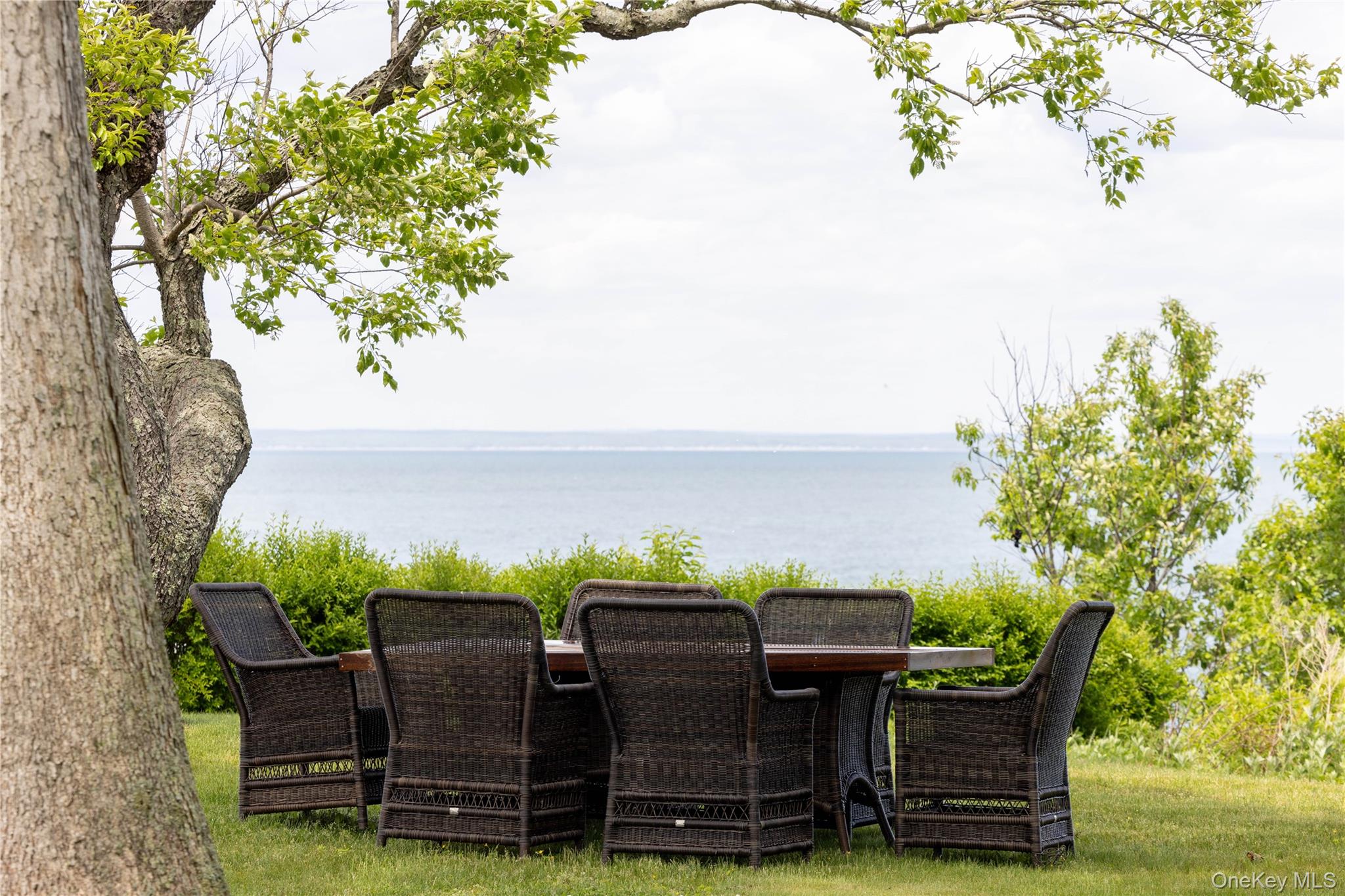2840 Stars Road East Marion, NY 11939 - Photo 36 of 43 a view of a chairs and table in a patio