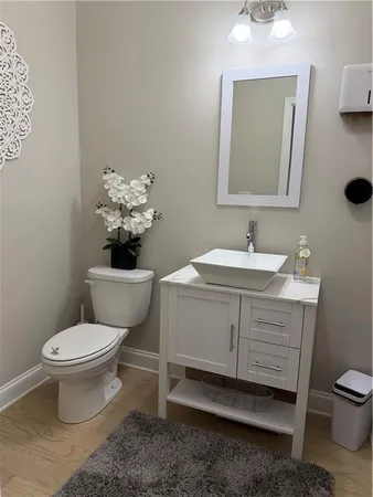 a shelf with cup and plates