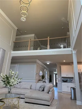 a bathroom with a toilet a sink and view