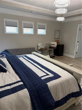 a bathroom with a tub and a shower