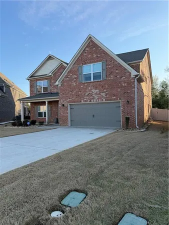 a view of kitchen with sink microwave and stove