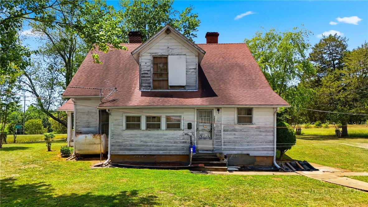 3450 Sparta Road North Wilkesboro, NC 28659 - Photo 28 of 34 a front view of a house with a yard