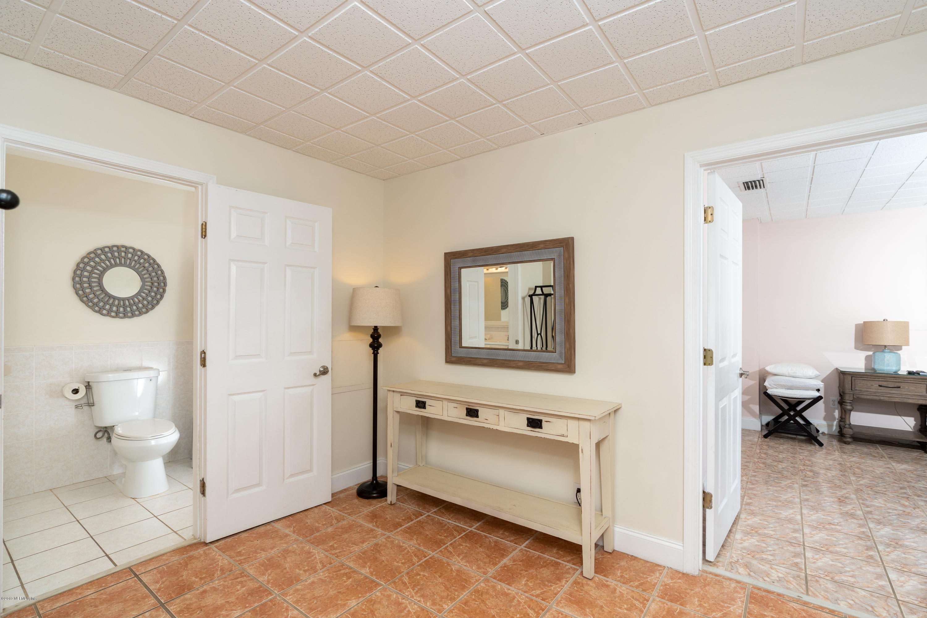 4 3rd Street St. Augustine, FL 32080 - Photo 12 of 47 a view of a room with shelves