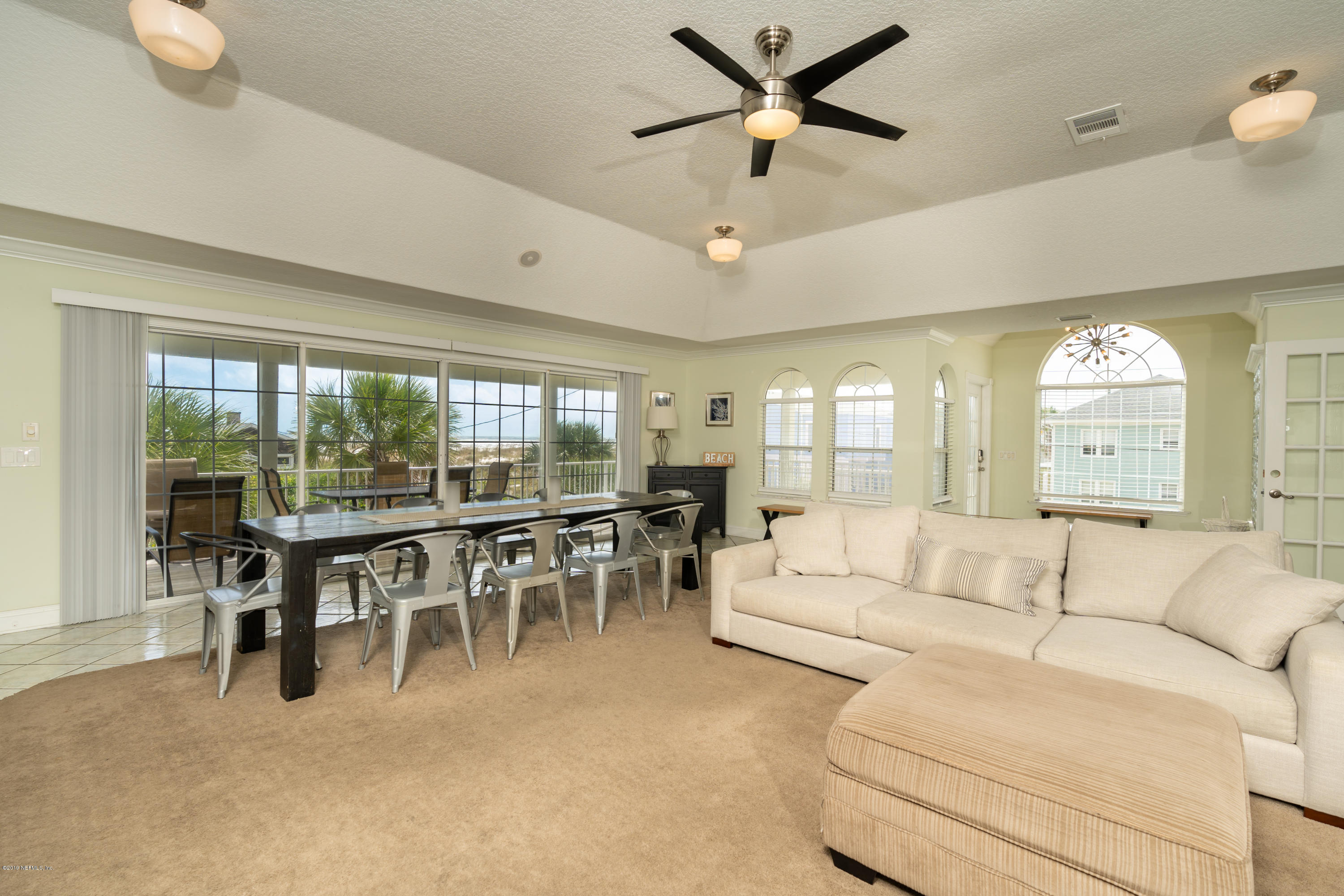 4 3rd Street St. Augustine, FL 32080 - Photo 20 of 47 a living room with furniture and a large window