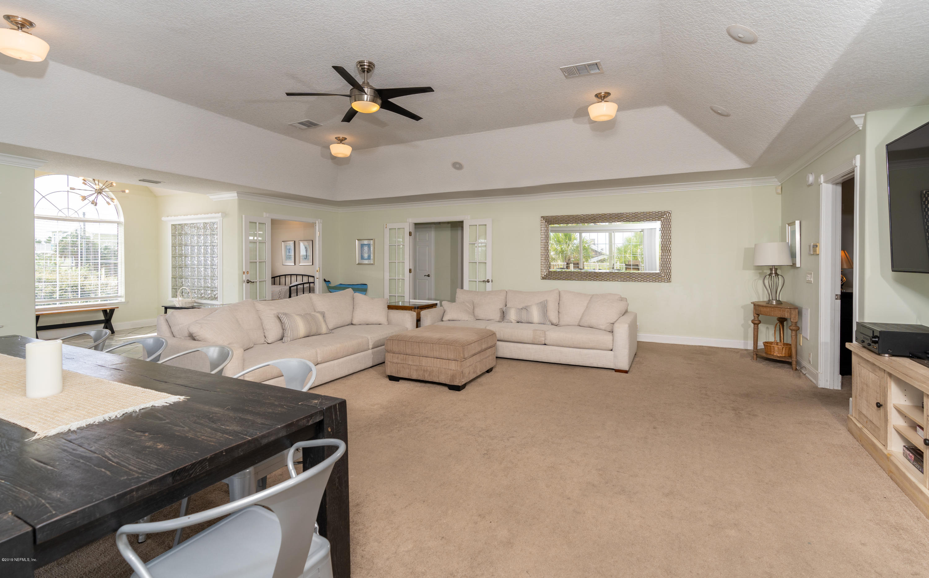 4 3rd Street St. Augustine, FL 32080 - Photo 21 of 47 a living room with furniture and a large window