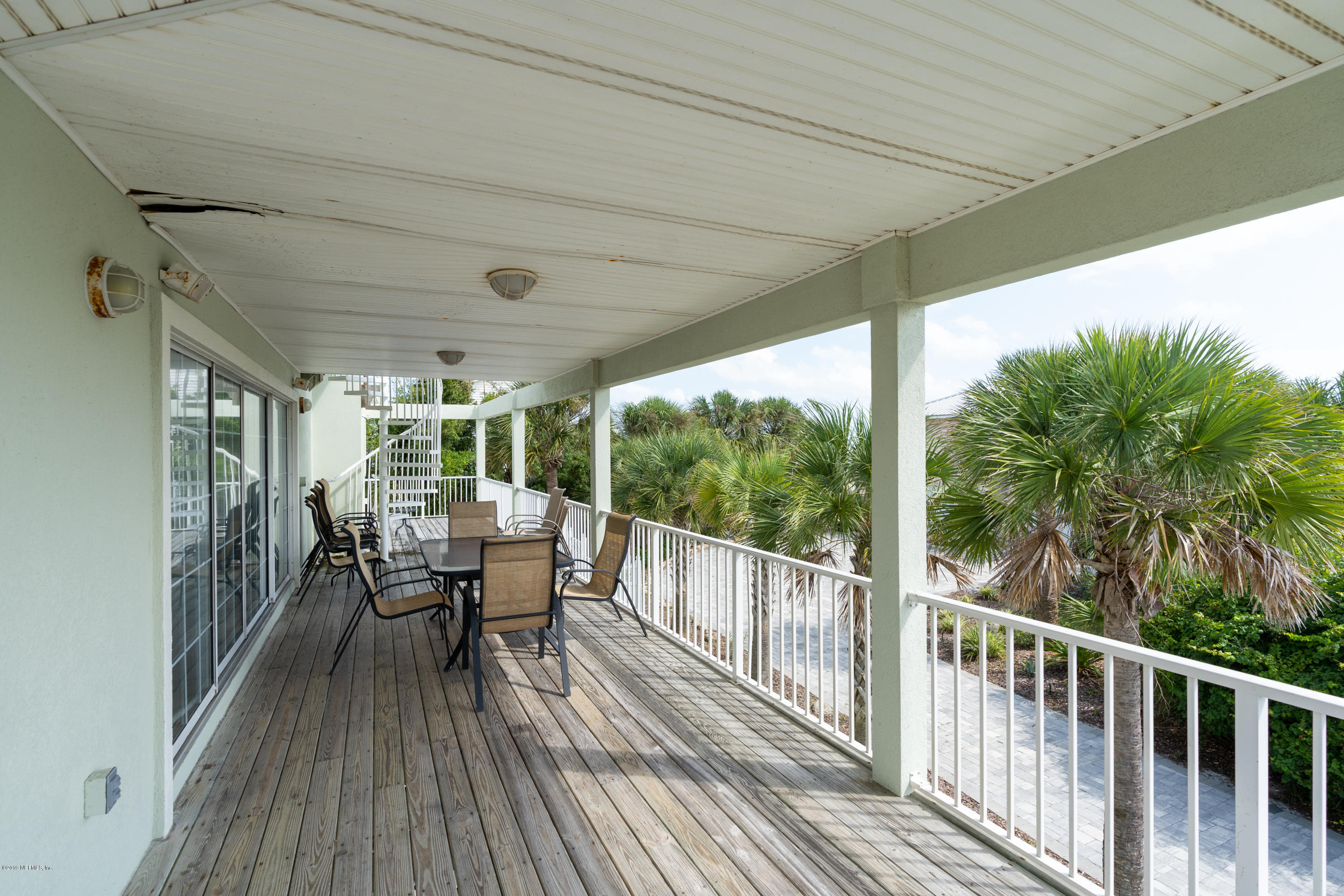 4 3rd Street St. Augustine, FL 32080 - Photo 40 of 47 a view of a two chairs in the balcony