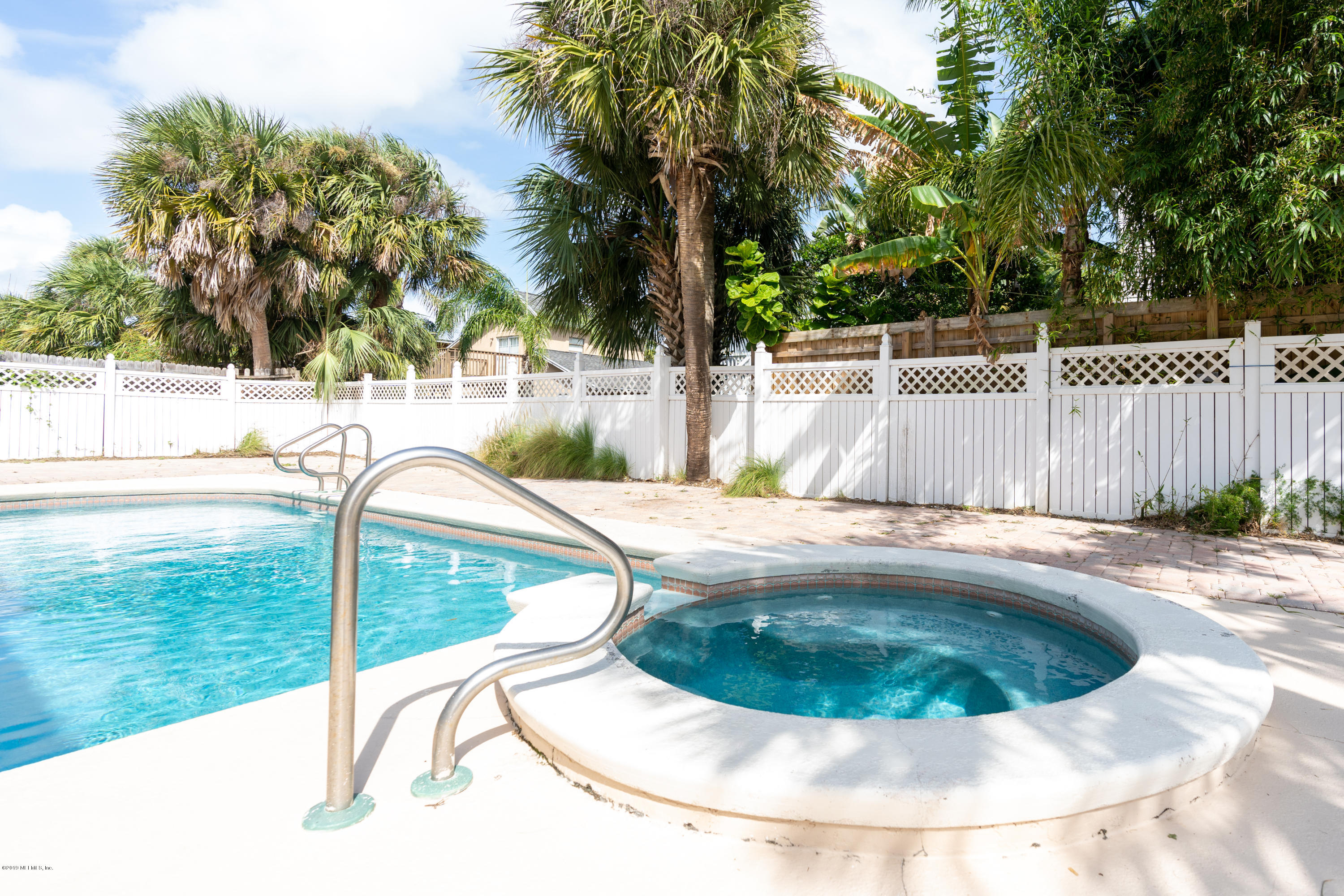 4 3rd Street St. Augustine, FL 32080 - Photo 4 of 47 a view of swimming pool with a garden