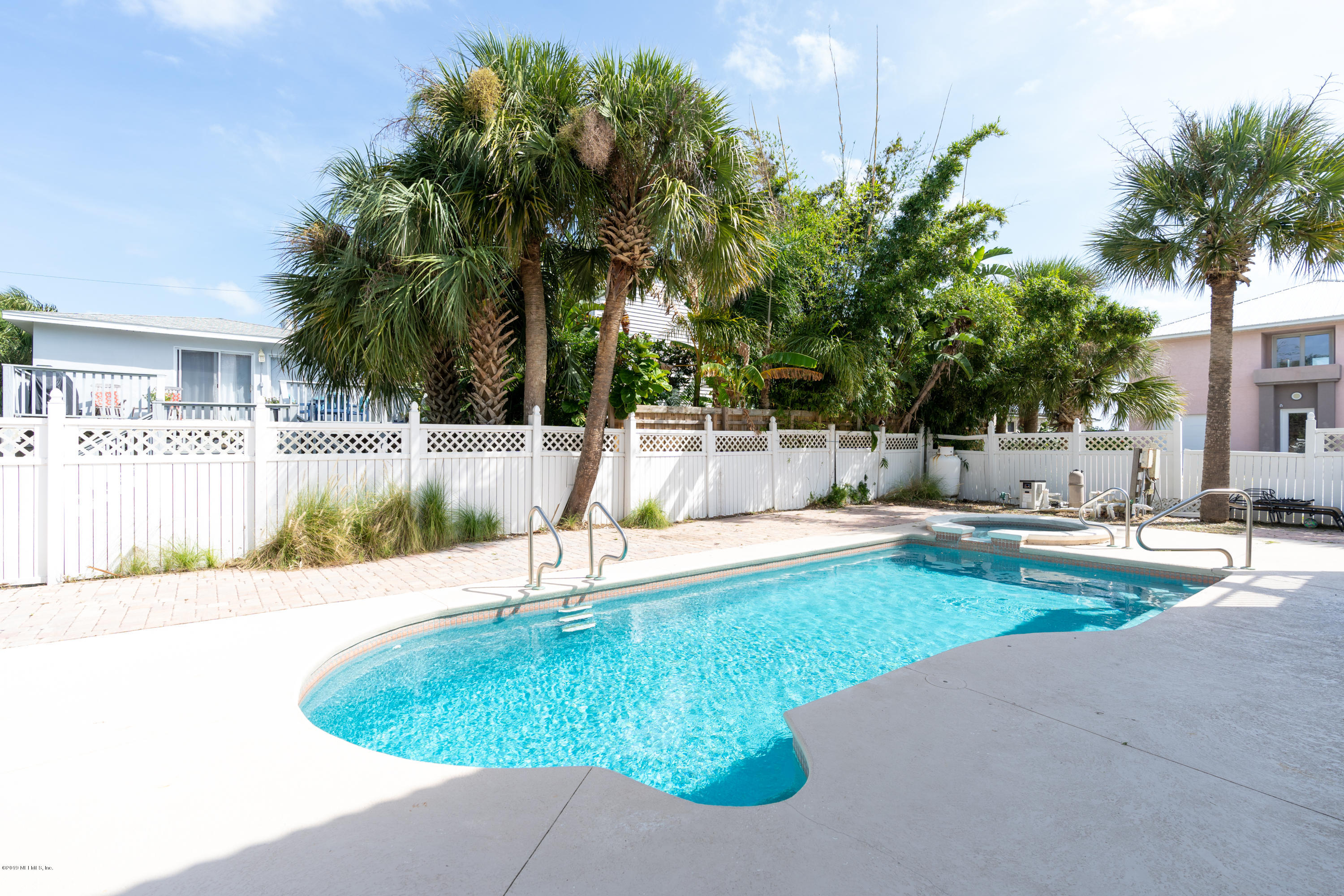 4 3rd Street St. Augustine, FL 32080 - Photo 5 of 47 a view of a swimming pool with a patio