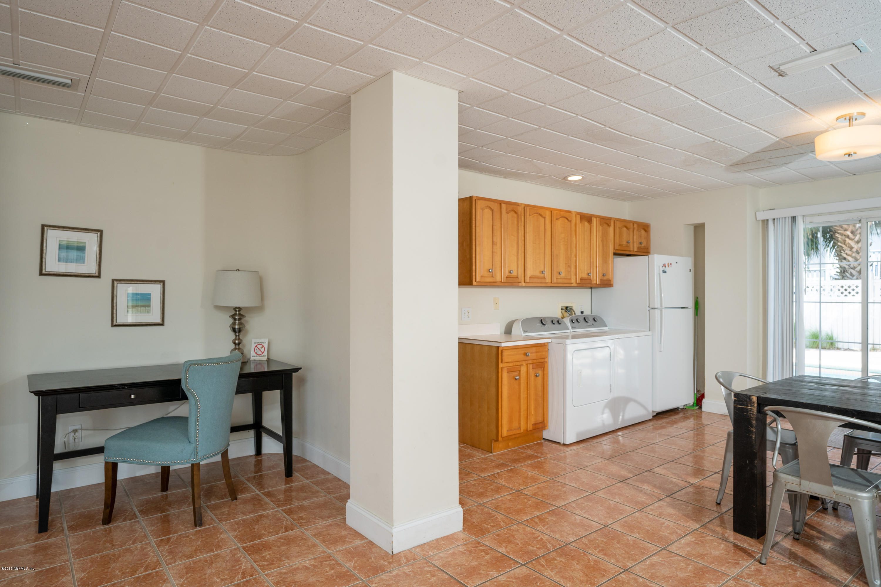 4 3rd Street St. Augustine, FL 32080 - Photo 9 of 47 a view of a kitchen with a sink cabinets and outdoor space