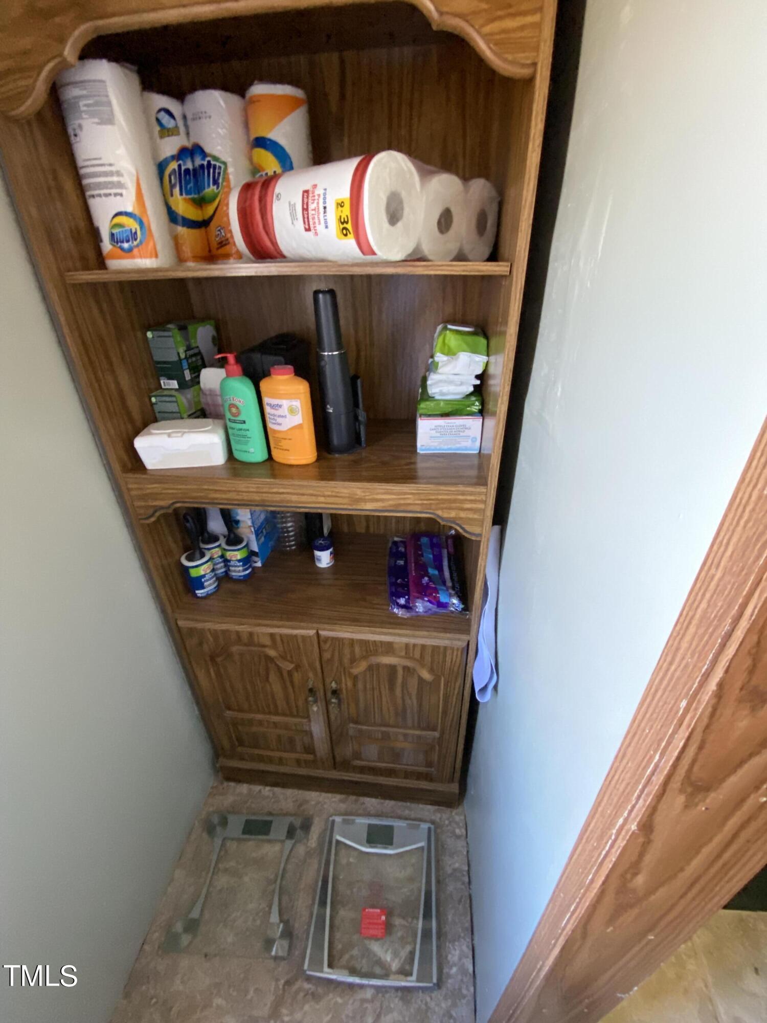 2637 Propus Wilkinson Road Bullock, NC 27507 - Photo 43 of 46 The stubbed in area for a shower is behind the shelf system in the half bathroom.