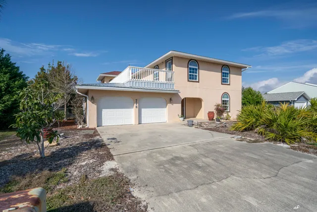 a kitchen with granite countertop a sink and a stove