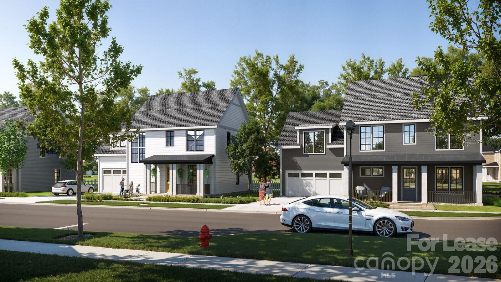 15400 Statesville Road, Unit A1 Huntersville, NC 28078 - Photo 4 of 11 a front view of a house with a yard