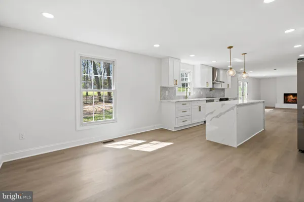 a living room with a fireplace