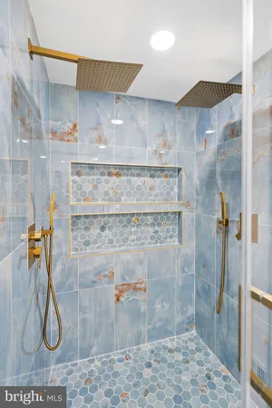 a view of a room with racks on the wall