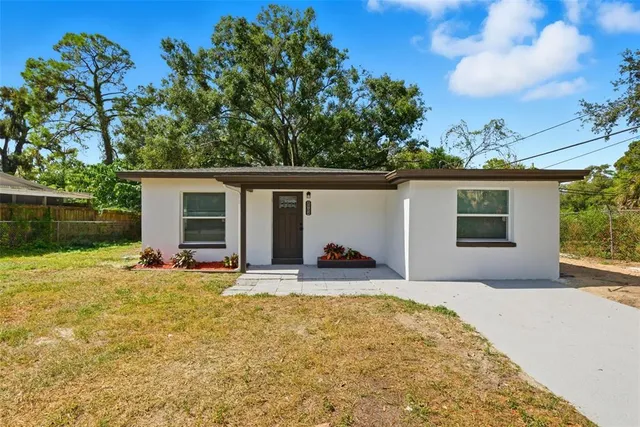 front view of a house with a patio