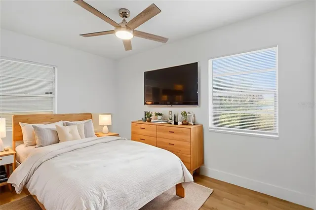 a bathroom with a sink toilet and a mirror