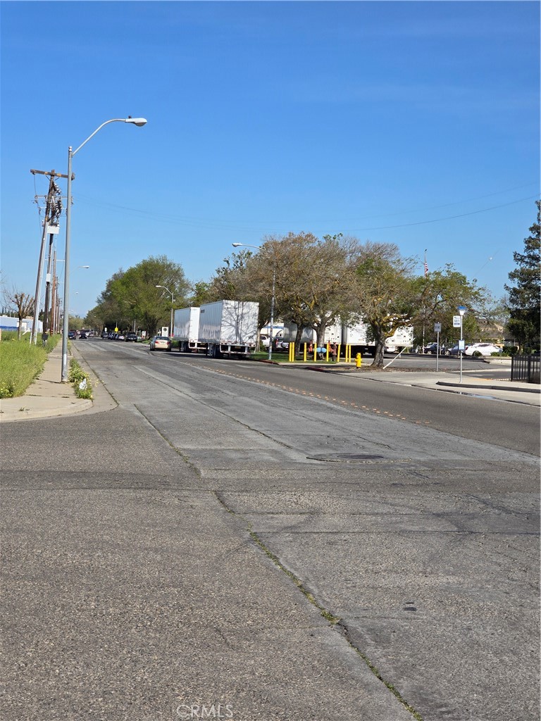 817 Beechcraft Avenue Merced, CA 95341 - Photo 4 of 7 a view of a city street with a building