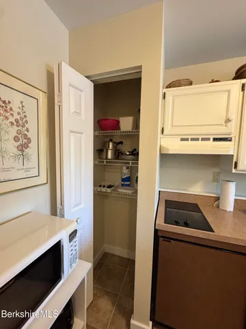 a view of a bathroom from a hallway