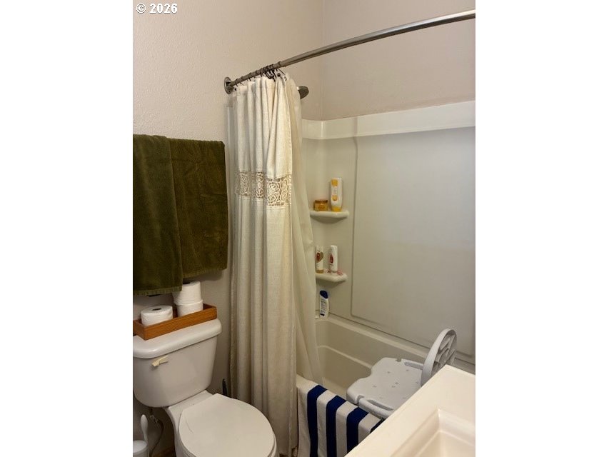 518 Northwest 4th Street Pendleton, OR 97801 - Photo 17 of 39 a bathroom with a toilet and a shower
