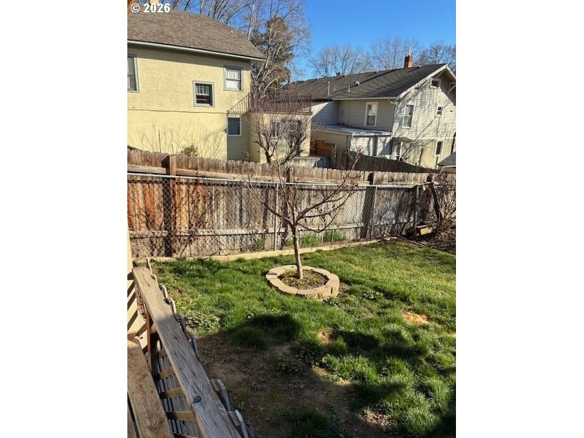 518 Northwest 4th Street Pendleton, OR 97801 - Photo 36 of 39 a patio with table and chairs and potted plants