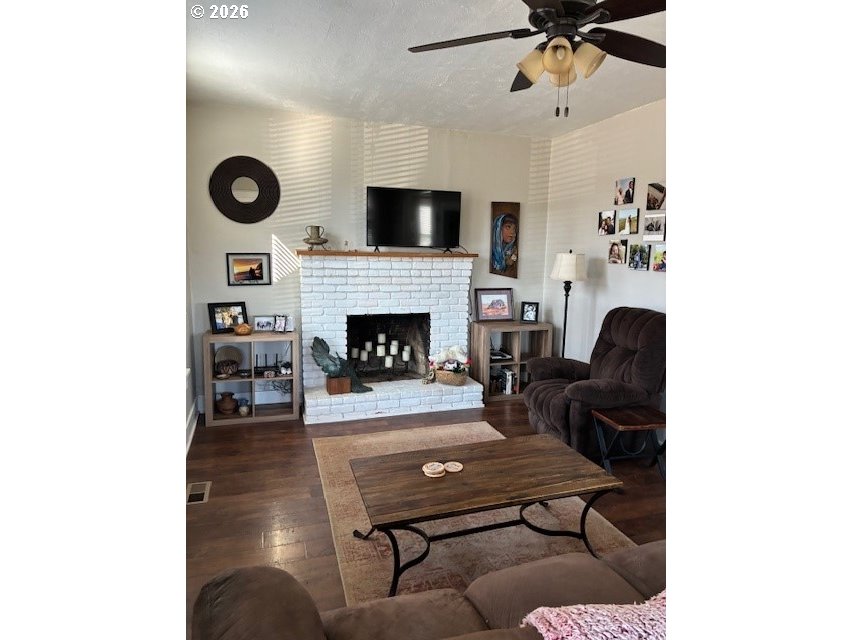 518 Northwest 4th Street Pendleton, OR 97801 - Photo 4 of 39 a living room with furniture and a fireplace
