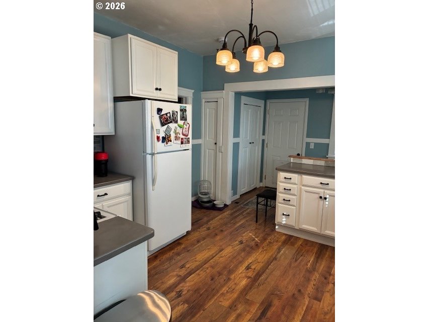 518 Northwest 4th Street Pendleton, OR 97801 - Photo 8 of 39 a kitchen with stainless steel appliances granite countertop a refrigerator and a stove top oven