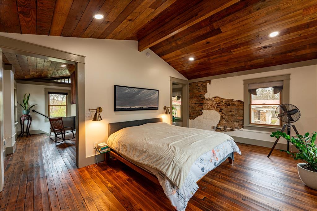 621 South Main Street Paris, TX 75460 - Photo 4 of 30 Bedroom with recessed lighting, wood-type flooring, baseboards, wood ceiling, and vaulted ceiling with beams