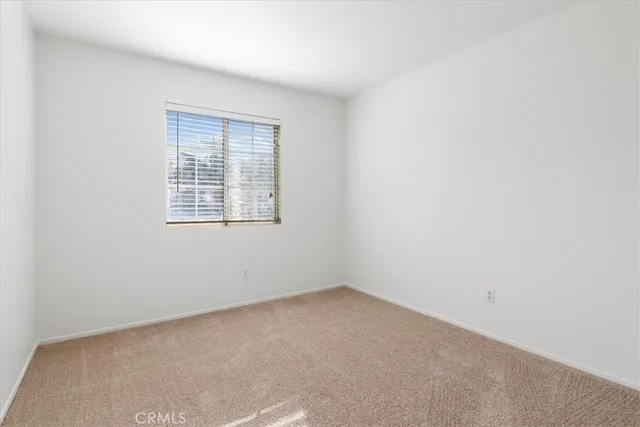 a view of hallway with washer and dryer